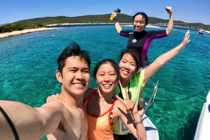 Blue Cave and Hvar 5 Islands full-day Speedboat Tour from Split - Stiniva Cove: dramatic cliffs, narrow entrance, and swim time