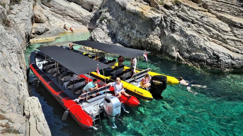 From Split: Blue Cave, Hvar, Mamma Mia, 5 Islands boat Tour - Budikovac Blue Lagoon: snorkel gear, white pebble shoreline, and the longest swim