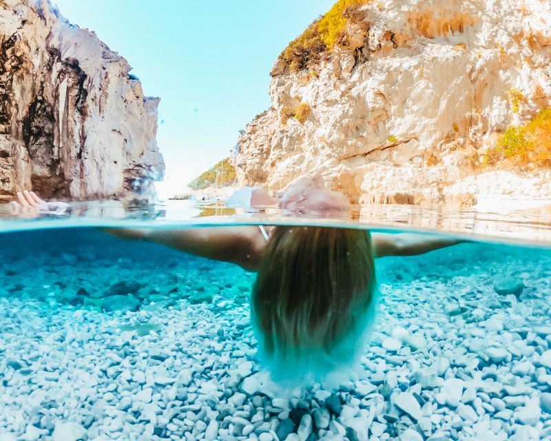 From Trogir or Split: Full-Day Blue Cave & Hvar Island Tour - Speedboat comfort and safety: jackets, life vests, and the bumpy reality