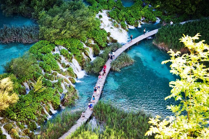 Plitvice Lakes Economy Group Tour from Split or Trogir - Getting on the bus: meeting point, voucher, and timing discipline