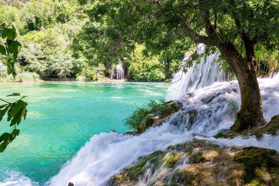 Split: Krka Waterfalls Guided Day Trip with Swim & Boat Tour - Walking the Park: Waterfalls, Photo Stops, and Comfortable Shoes