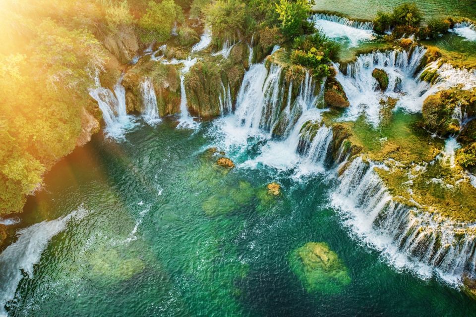 Split: Krka Waterfalls Trip with Boat Cruise and Swimming - The return to Split: coast views and two drop-off points