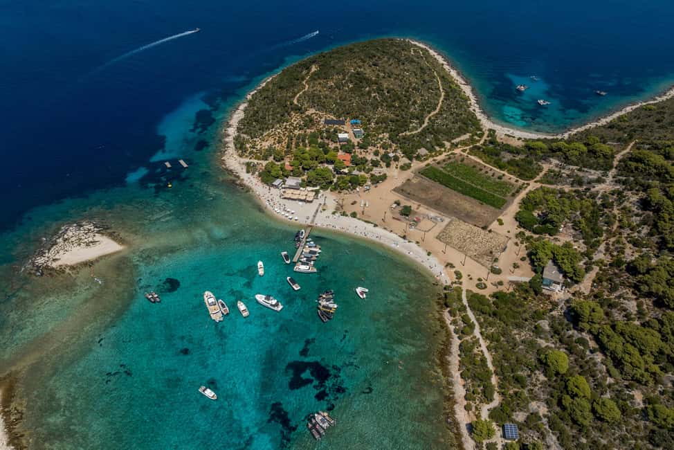 Split or Trogir: Blue Cave, Vis, and Hvar Speedboat Day Trip - Veliki Budikovac: Snorkeling Gear, a Beach Break, and a Coffee Pause