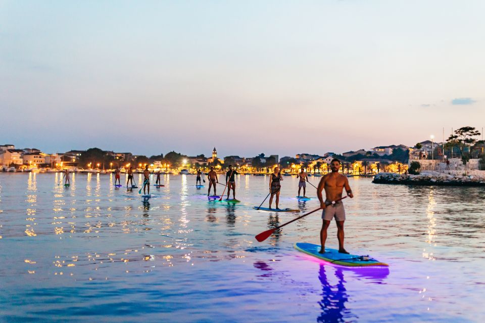 Split: Stand Up Paddleboard Night Glow Tour - Sliding onto the river: stars overhead and wildlife under the light
